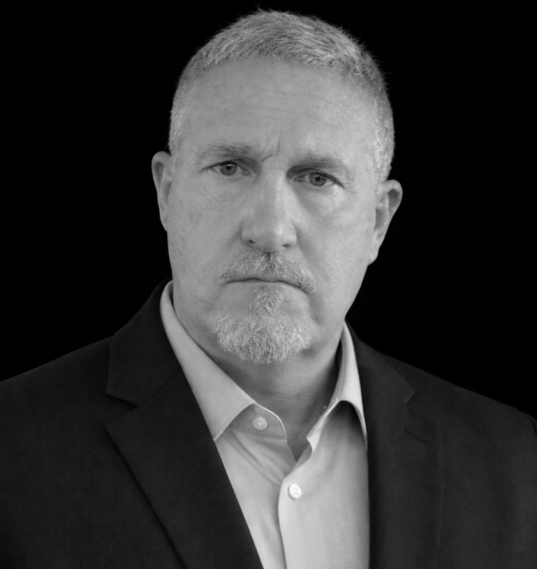 Steve John black and white headshot.